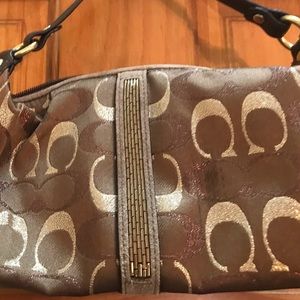 Small brown with beaded design Coach bag